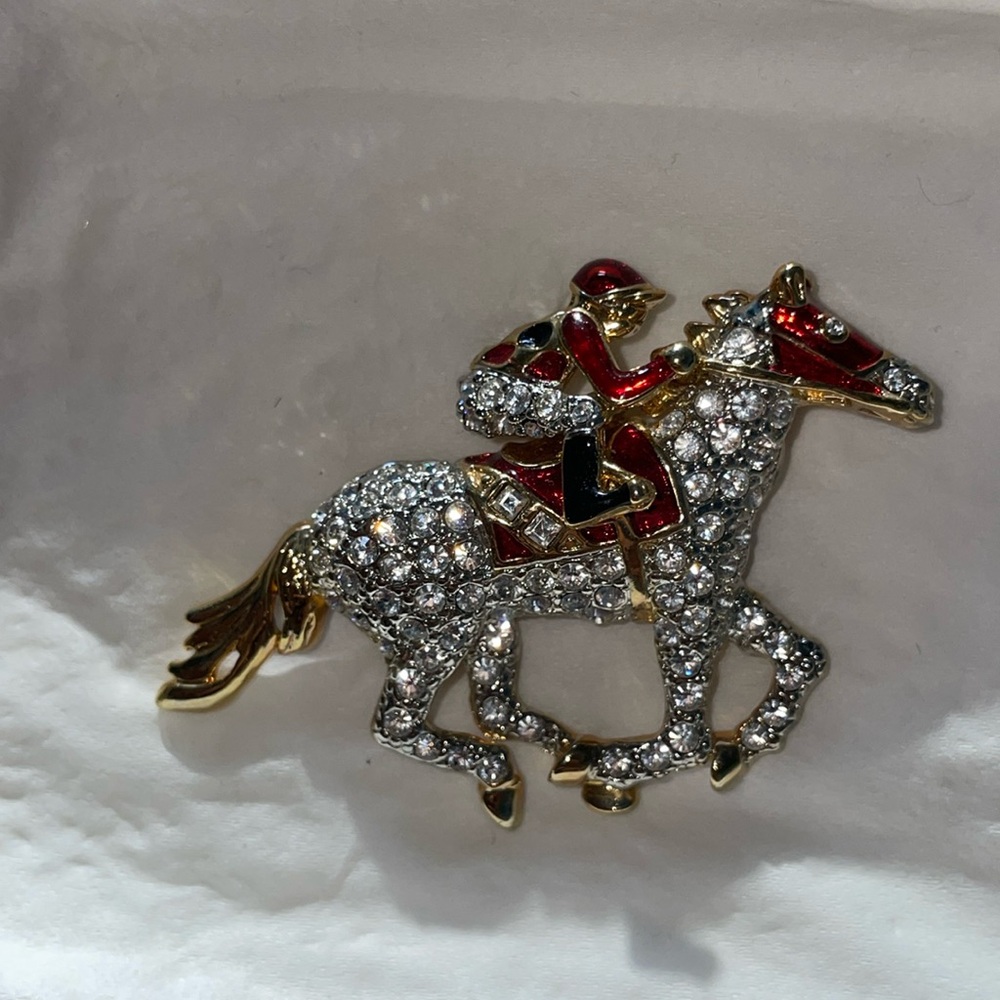Horse rider brooch